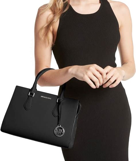 cultural challenges michael kors can potentially ace|Michael Kors handbags news.